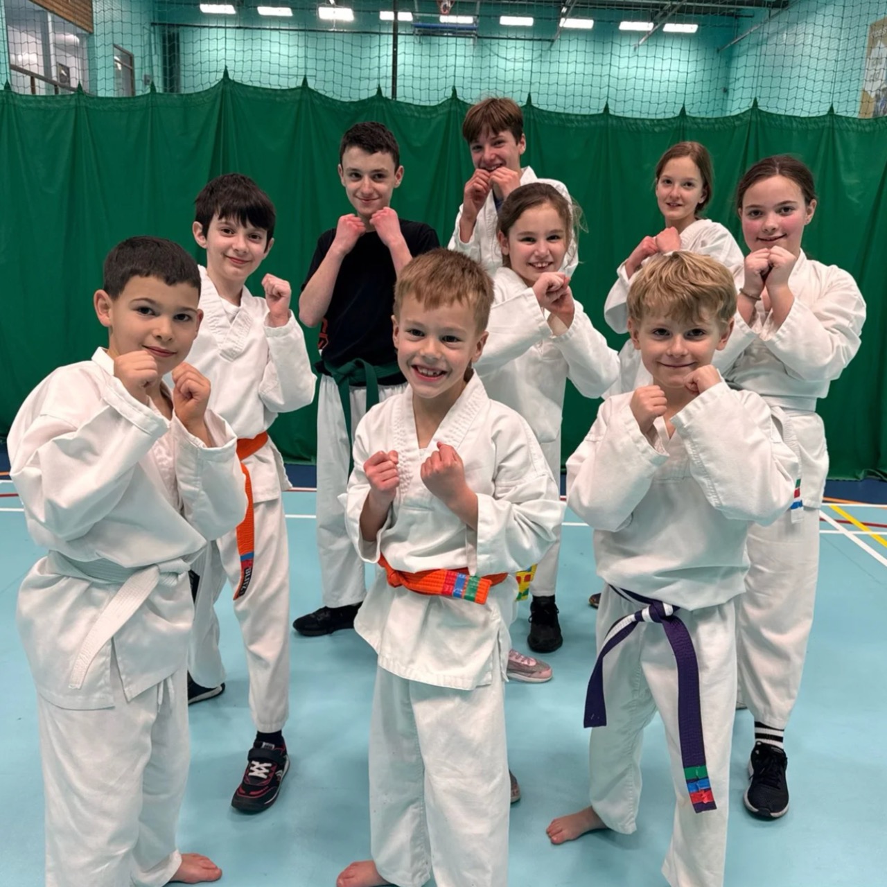 AG Martial Arts children in class smiling and training together